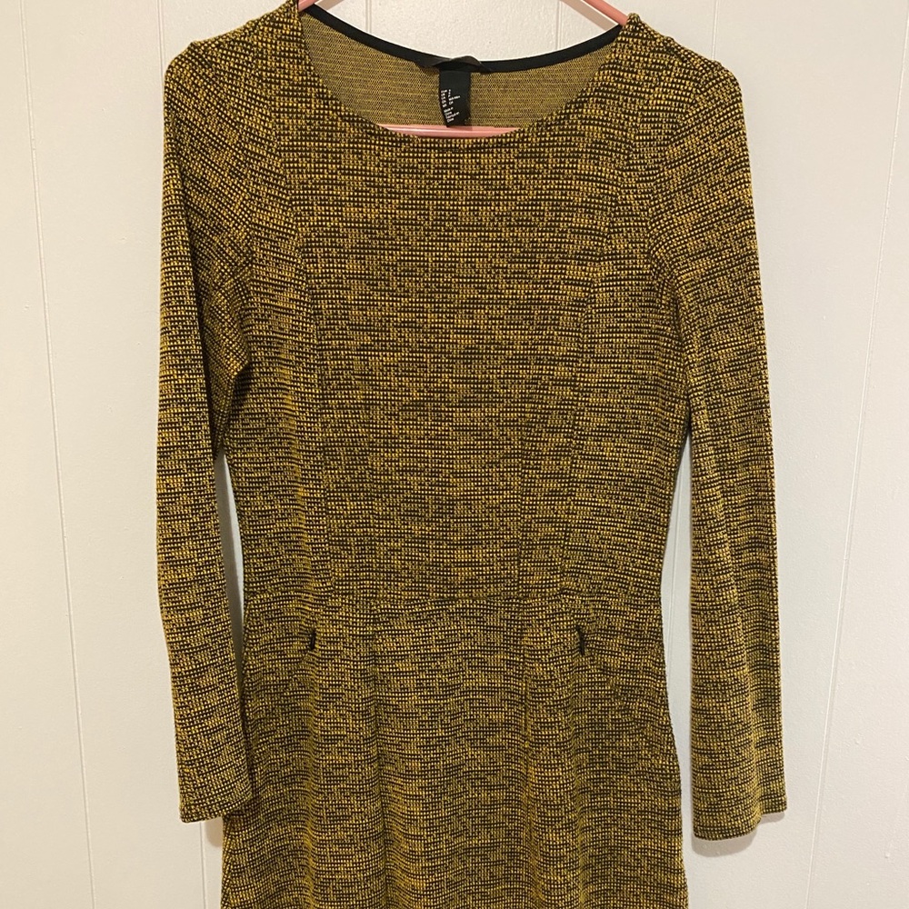 warm fabric. worn once. little above the knee.